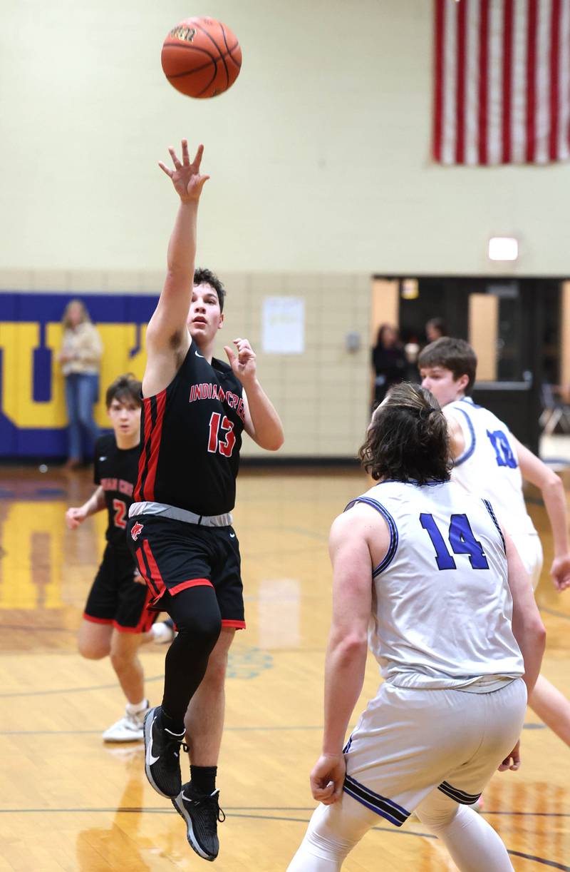Indian Creek's Sam Genslinger gets up a shot Hinckley-Big Rock's Martin Ledbetter during their game Tuesday, Jan. 31, 2023, in the Little 10 Conference Basketball Tournament at Somonauk High School.