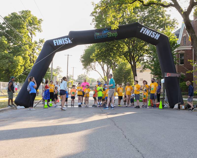 Participants of the 1 mile run get lined up at the starting line on Friday June 9, 2023 during the Leadershop event held in La Grange.