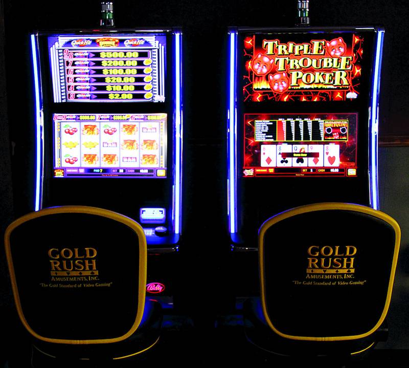 Two of five video gaming machines available at The Last Alarm Firehouse Pub. The bar in Amboy has seen many new customers since the machines were installed last spring.