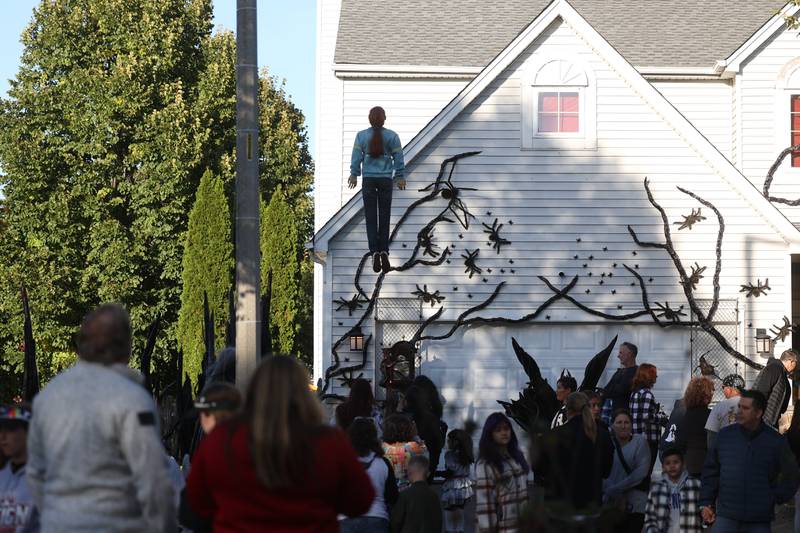 Hundreds of visitors came out to Dave Appel’s "Stranger Things"-themed Halloween display. The Plainfield Halloween display featuring a levitating Max from the Netflix show "Stranger Things" went viral on social media. Saturday, Oct. 8, 2022, in Plainfield.
