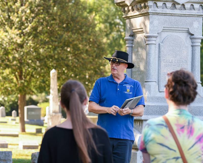 Lars Jacobson talks about John Black and some of his family during the Etched in Stone cemetery walk on Sunday Oct. 5, 2025, held at Elmwood cemetery in Sycamore.