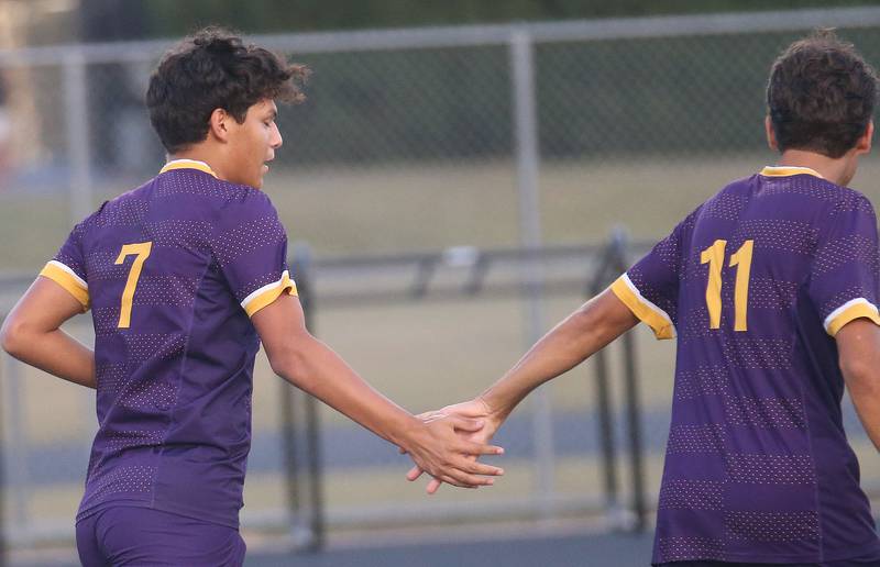 Mendota's Isaac Diaz hi-fives teammate Cesar Casas after scoring a goal during the Three Rivers Tournament on Thursday, Oct. 2, 2025 at Mendota High School.