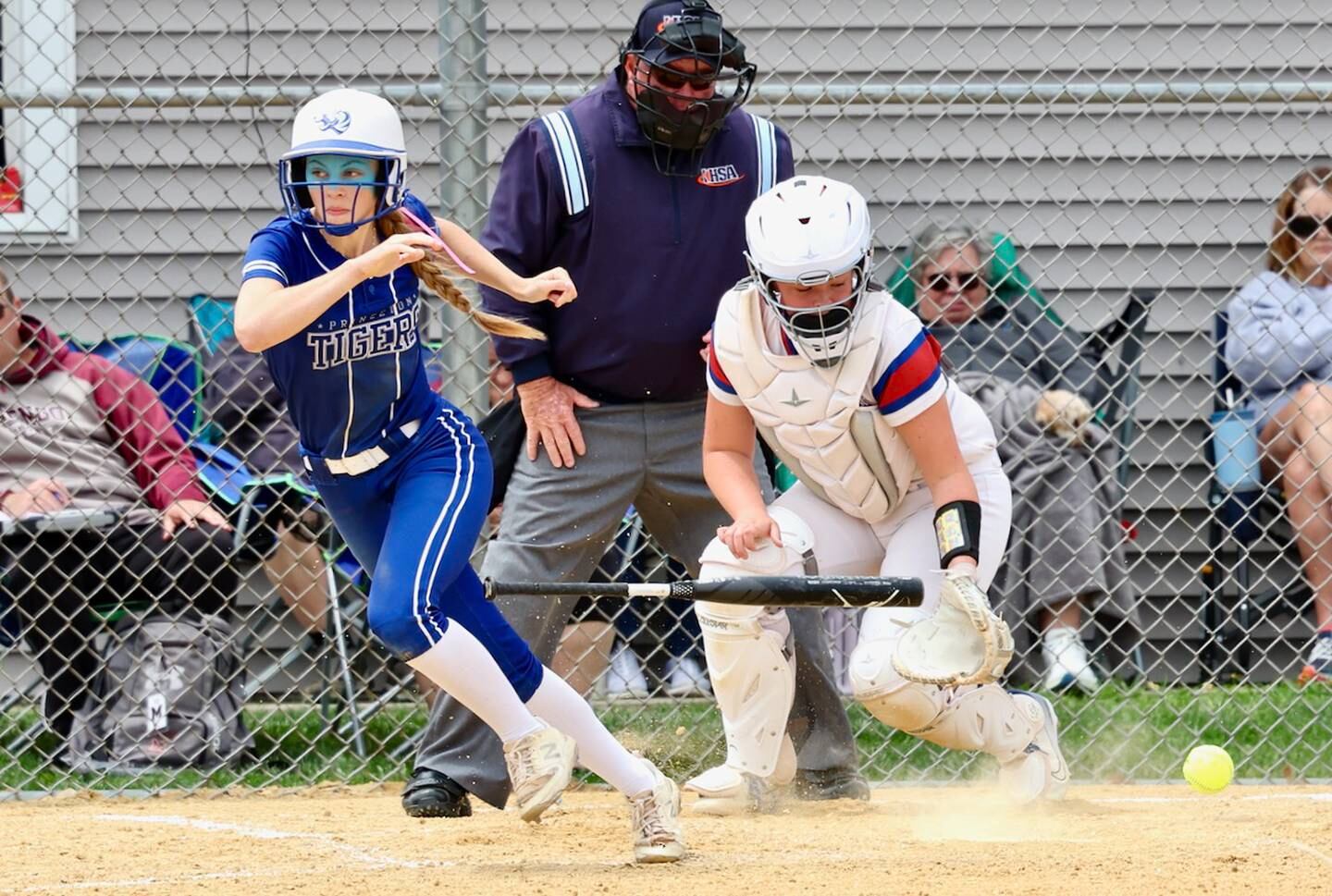 Princeton's Caroline Keutzer slaps a hit in Saturday's regional championship at Princeton. Morrison won 9-0.