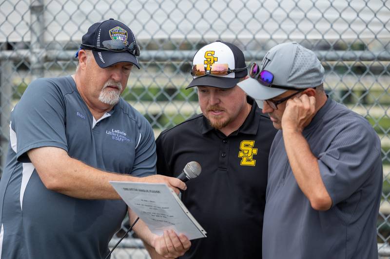 (left to right) Rob Ruppert, Jason Mcnutt and Mike Argubright announce the parent expectations at the Central Region Tournament, opening Ceremony on Friday, July 11, 2025 at Washington Park in Peru.