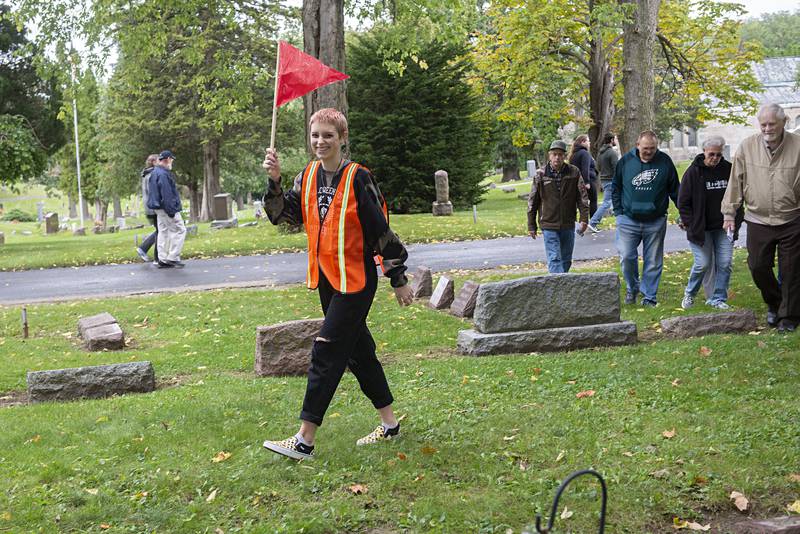 Volunteer Emma Russell leads her group to the next telling during the Lee County Historical and Genealogical Society’s cemetery walk, Sunday, Sept. 25, 2022 at Oakwood Cemetery in Dixon.