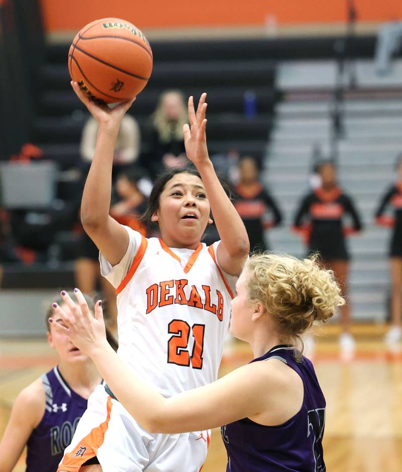 DeKalb's Alicia Johnson shoots over Rochelle's Abby Metzger during their game Monday, Nov. 28, 2022, at DeKalb High School.
