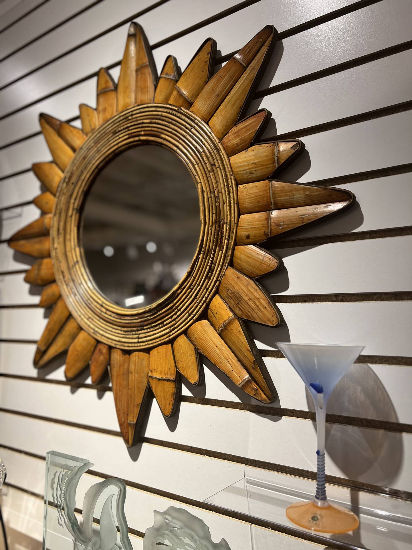 Fine art and artisan creations adorn the walls of the shop.