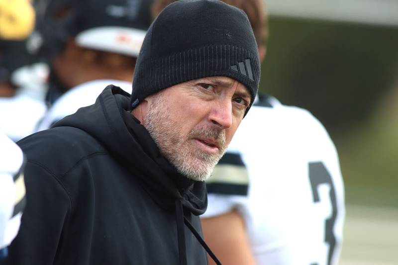 Sycamore’s Head Coach Joe Ryan leads the Spartans in IHSA football Class 5A first-round playoff action at Al Bohrer Field on the campus of Cary-Grove High School in Cary on Saturday, November 1, 2025.