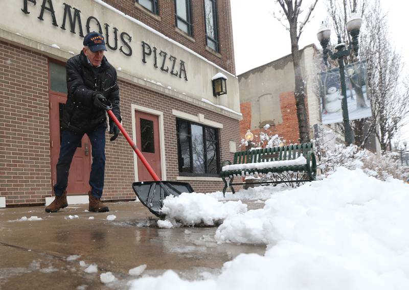 Pat Graham shovels snow near La Salle Street and Main Street on Wednesday, Jan. 25, 2023 downtown Ottawa.
