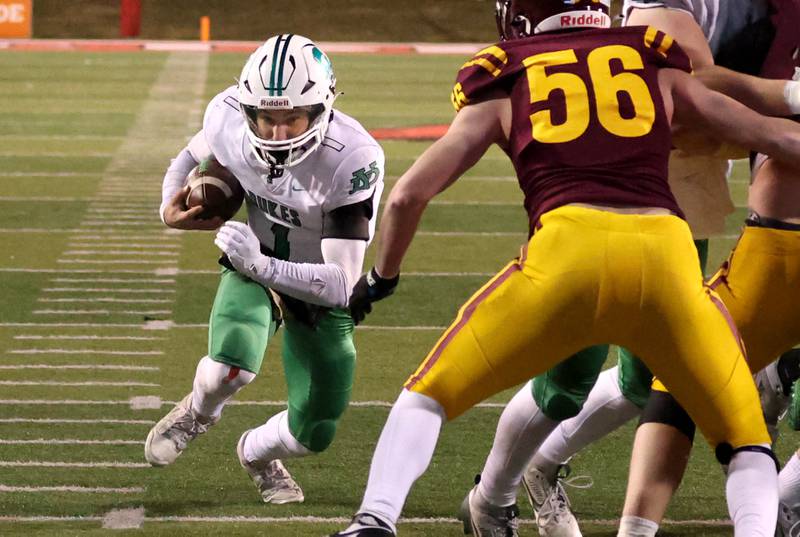 York’s Bruno Massel scores a touchdown as he runs by Loyola Academy's Henry Newton during their Class 8A state championship game Saturday, Nov. 30, 2024, in Hancock Stadium at Illinois State University in Normal.