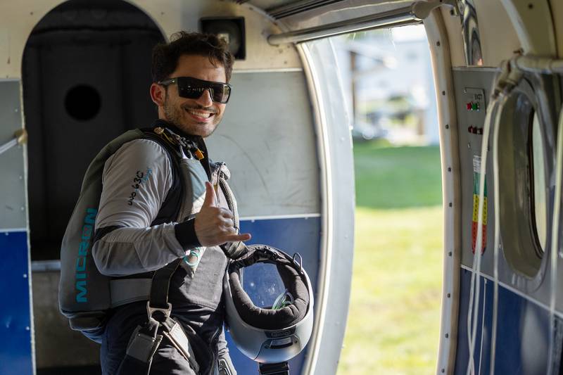 Isaac Roberto boards plane before attempting the  state record of most jumpers in belly formation on Wednesday, Aug 20, 2025 above Skydive Chicago in Ottawa.