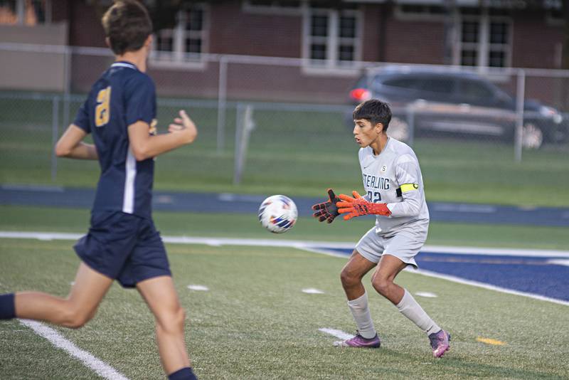 Sterling goalie Marco Chino fields a ball against Geneseo Tuesday, Sept. 20, 2022.