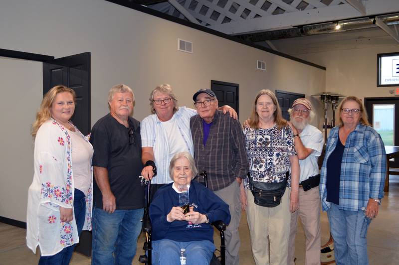 Oregon Area Chamber of Commerce Citizen of the Year Earleen Hinton poses with her family following the award presentation at the Chamber's dinner on Thursday, Aug. 15, 2024. Pictured left to right are: Lindsey Breeden, Monti Peterson, Earleen Hinton, Terry Thomas, Dixie Hinton, John Werschey and Jeanette Peterson. Seated is Ida Hinton, Earleen's mother.