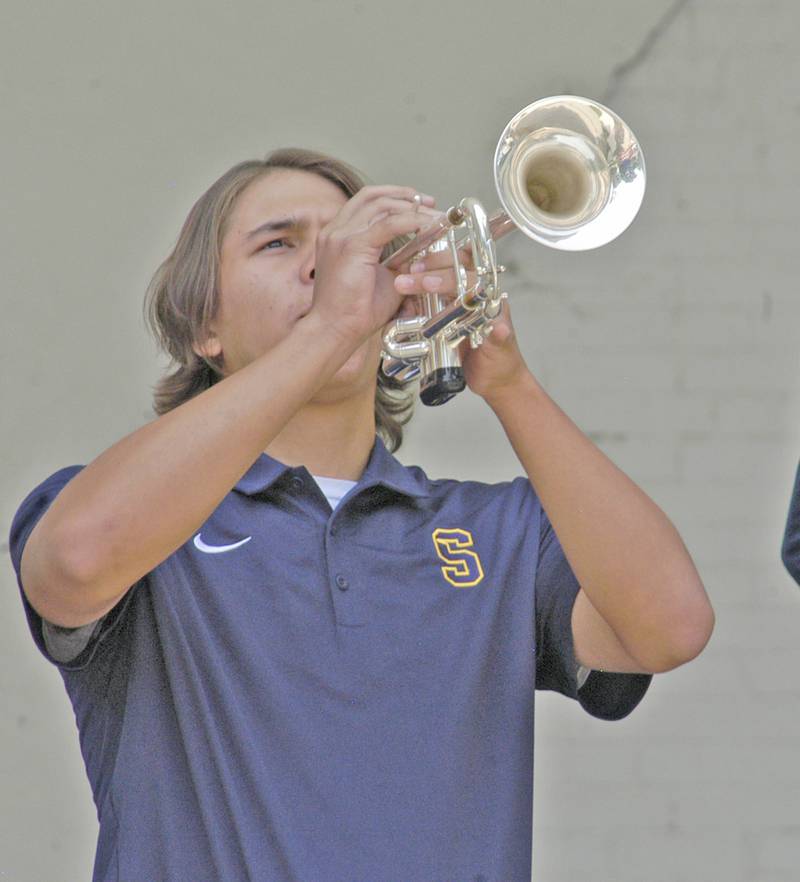 Jacob Maruffo plays taps Monday, May 26 during Sterling American Legion Post's Memorial Day commemoration at Grandon Civic Center in Sterling.