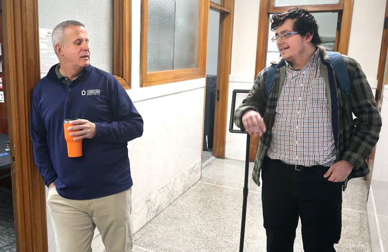 DeKalb City Clerk Sasha Cohen (right) talks to mayor Cohen Barnes Monday, Dec. 12, 2022, at City Hall, after Sasha Cohen was informed he would not be the person to accept candidate filings. Filing opened Monday at 8:30 a.m. and Ruth Scott, recording secretary to the DeKalb City Council, was on hand to accept the paperwork for candidates who were filing.