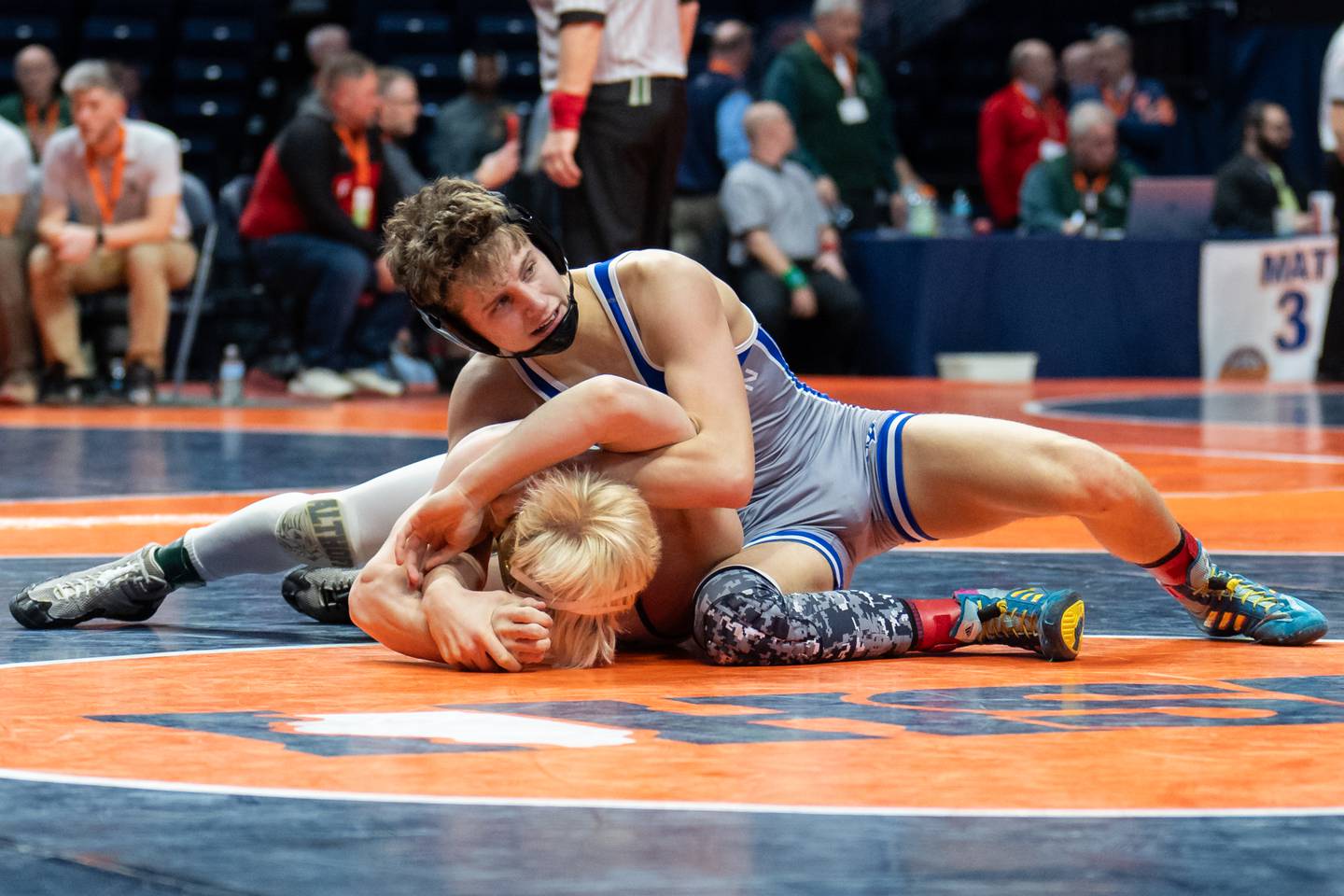 Princeton freshman Kane Dauber (right) wrestles during the IHSA Class 1A state tournament on Saturday, Feb. 22, 2025 in Champaign. Dauber placed fifth at 132 pounds.
