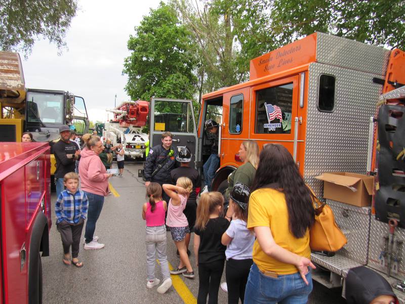 Kids line up to for the Touch a Truck.