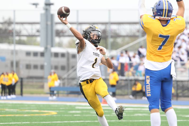 Joliet West’s Antonio Brooks passes on the run against Joliet Central on Saturday, Sept. 28, 2024 in Joliet.