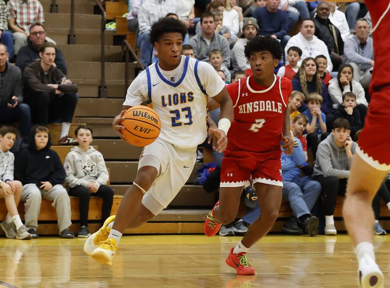 Lyons Township's Blake Ragsdale (23) drives to the basket during a varsity basketball game between Hinsdale Central and Lyons Township high schools on Friday, Dec. 12, 2025 in La Grange.