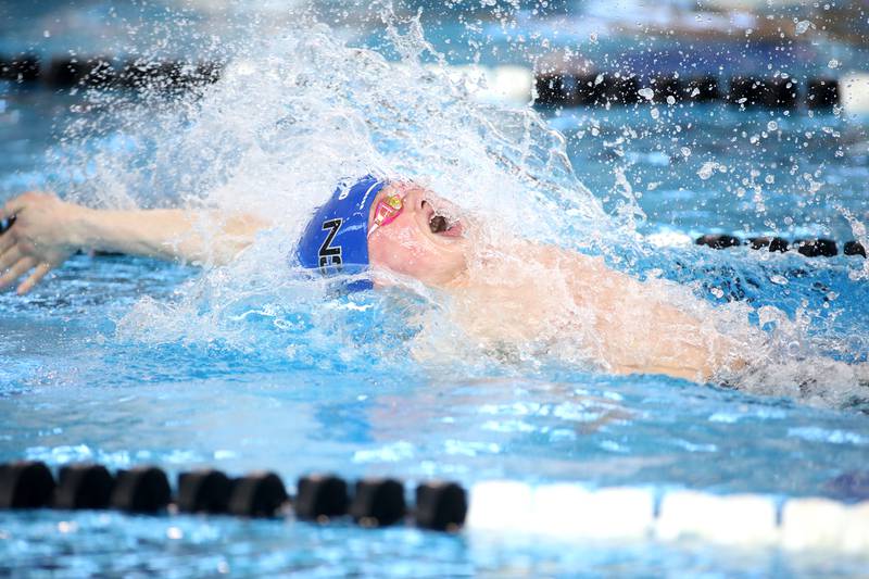 St. Charles North’s Thomas McMillan swims the backstroke leg of the 200-meter medley relay championship heat during the IHSA Boys State Championships on Saturday, March 1, 2025 at the FMC Natatorium in Westmont.