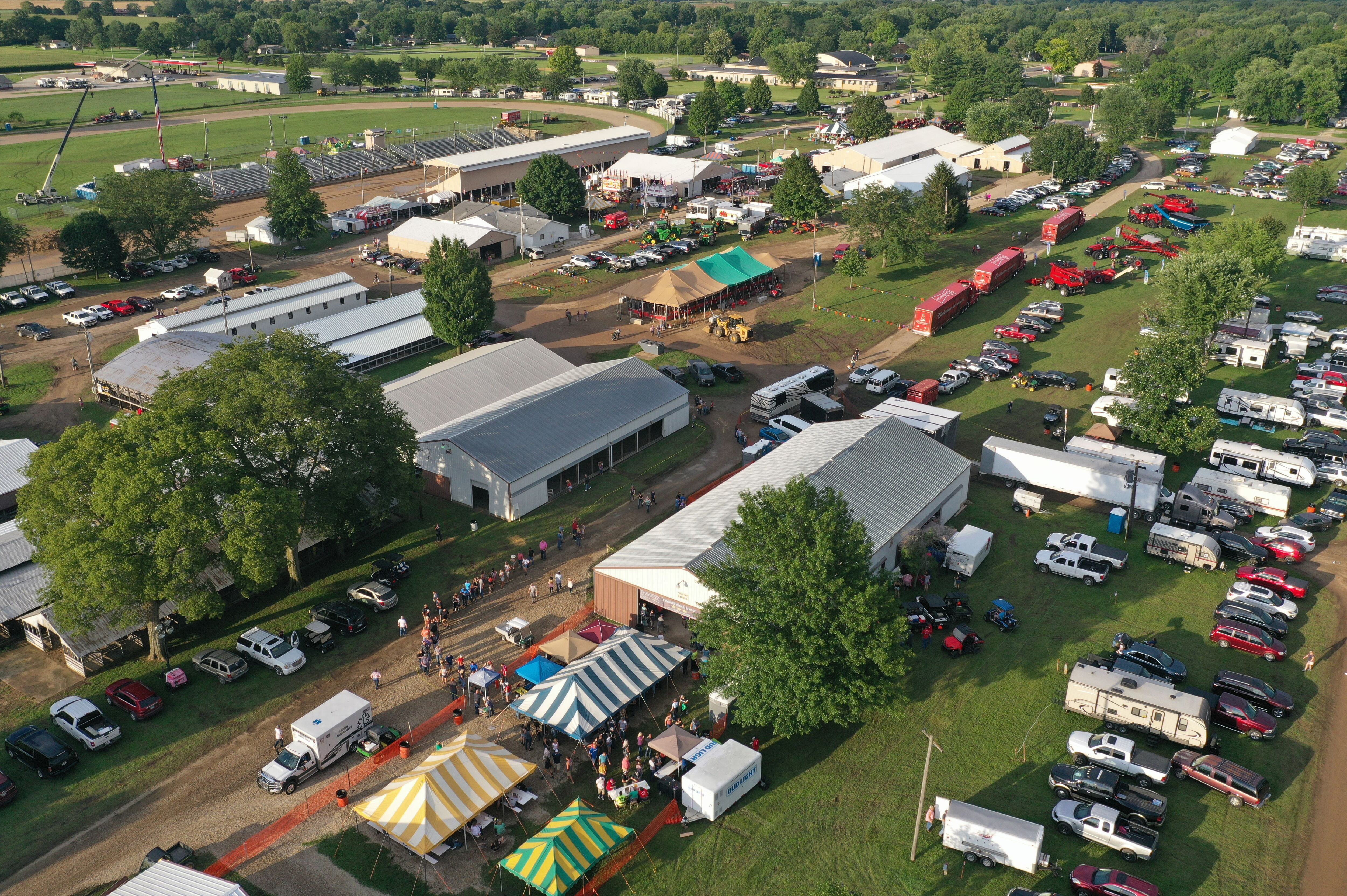An aerial view of the ticket line and fairgrounds at the 100th annual Marshall-Putnam Fair in Henry on Thursday July 15, 2021. Tracy Byrd headlined the fair. The concert was moved into the sheep barn due to inclement weather. 