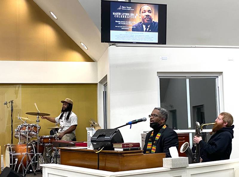 (From left): Billy Evans, Jr., Vincent Bland and Jacob Slocum, perform the hymn "Lift Every Voice and Sing" while the crowd sings along at the annual Martin Luther King, Jr. Celebration event on Monday, Jan. 20, 2025, at New Hope Missionary Baptist Church, 1201 Twombly Road, DeKalb.