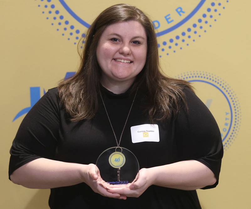 Corrina Trumbo poses with her 40 Under Forty award during the Illinois Valley Chamber of Commerce Champions of Change Awards Night on Wednesday, May 6, 2026 at the Westclox Event Center in Peru.