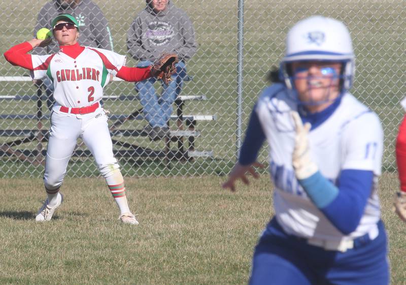 L-P's Karmen Piano throws the ball into the infield as Princeton's Keely Lawson rounds second on Tuesday, March 19, 2024 in Princeton.