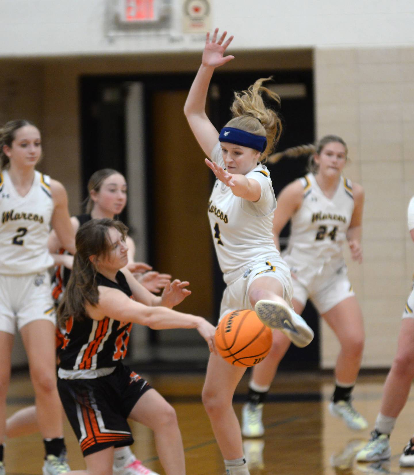 Polo's Camrynn Jones defends against Milledgeville on Thursday, Dec. 19, 2024 at the Polo Christmas Tournament.