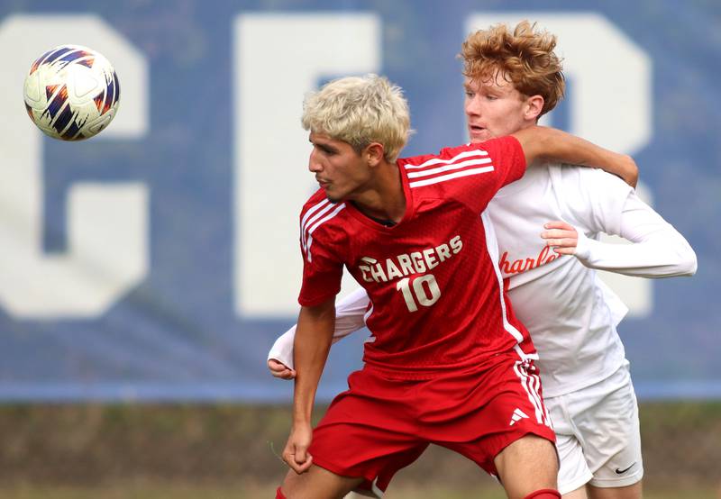 Dundee-Crown’s Sebastian Sanchez battles St. Charles East’s Carter Newell in IHSA Class 3A Regional Championship soccer at Dundee-Crown High School in Carpentersville on Saturday, October 25, 2025.
