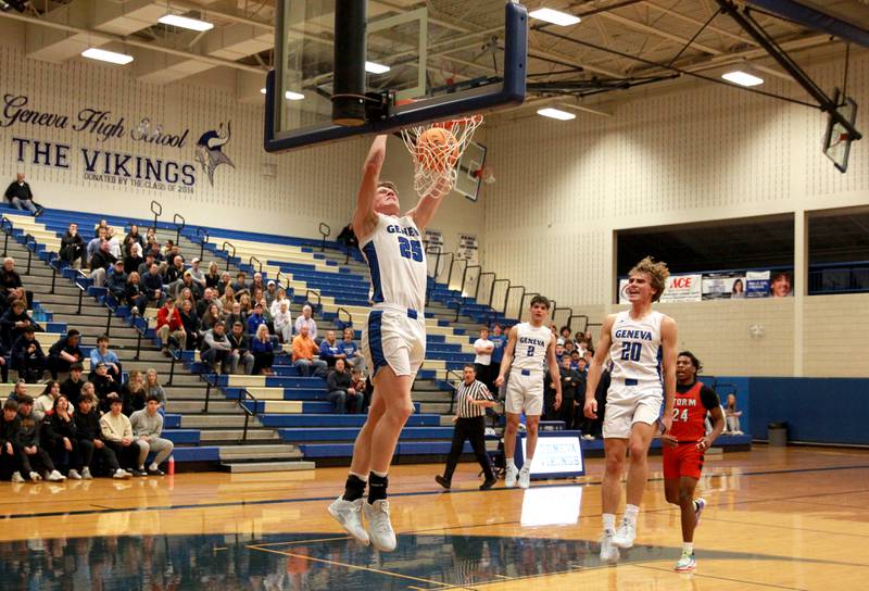 Geneva’s Hudson Kirby dunks the ball during a game against South Elgin on Monday, Nov. 25, 2024 in Geneva.