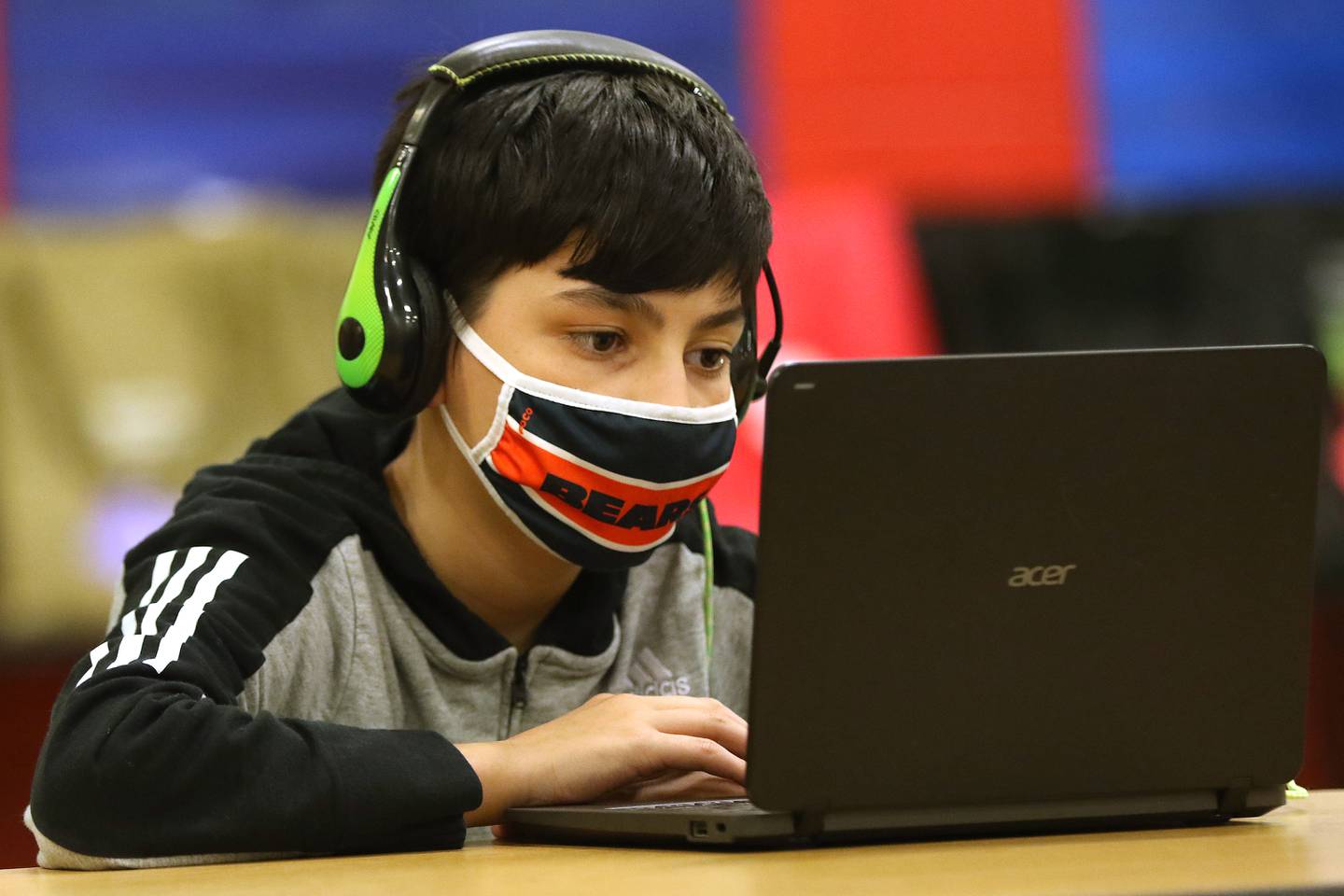 Sixth grade student Karter Hall works on his homework in an after school homework help program at Marengo Community Middle School on Wednesday, March 24, 2021 in Marengo.