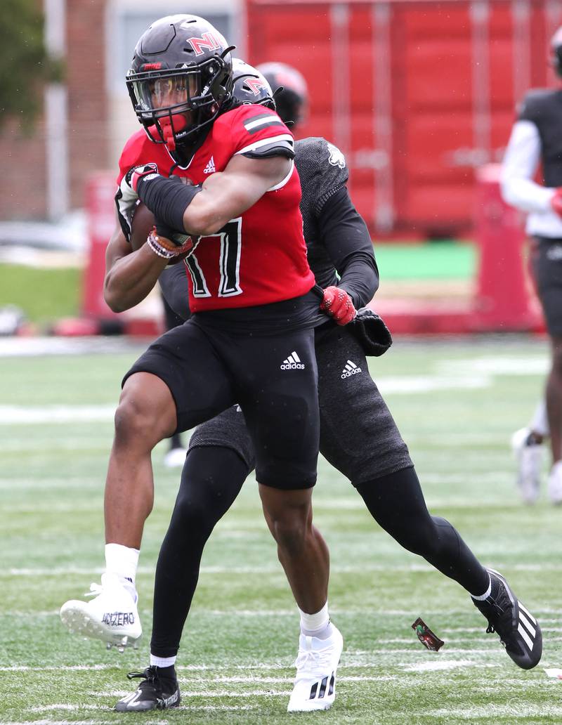 Northern Illinois wide receiver Eli Reed carries the ball after a catch during the NIU football Spring Showcase Saturday, April 22, 2023, at Huskie Stadium at NIU in DeKalb.