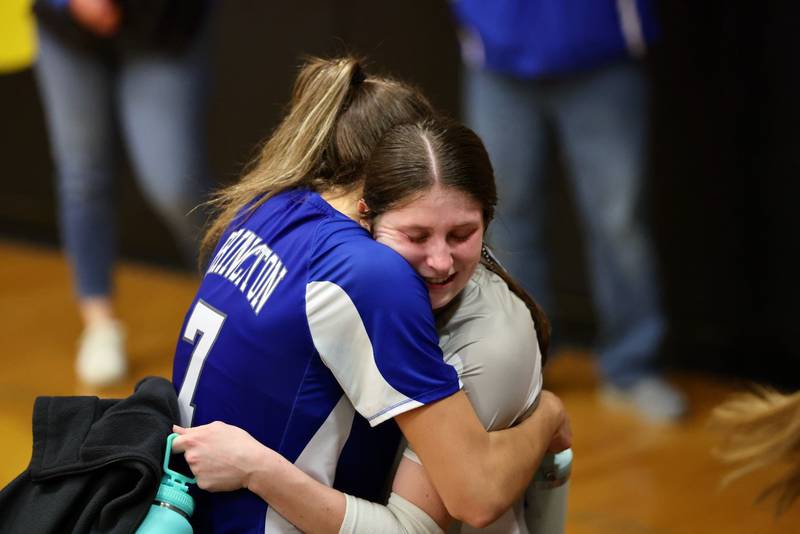 Kathy Maciczak (left) hugs Princeton teammate Camryn Driscoll after Tuesday's sectional semifinals lost to Peoria Notre Dame at Riverdale.