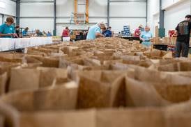 Sherman’s marks 50th anniversary with meal-packing event for hungry children