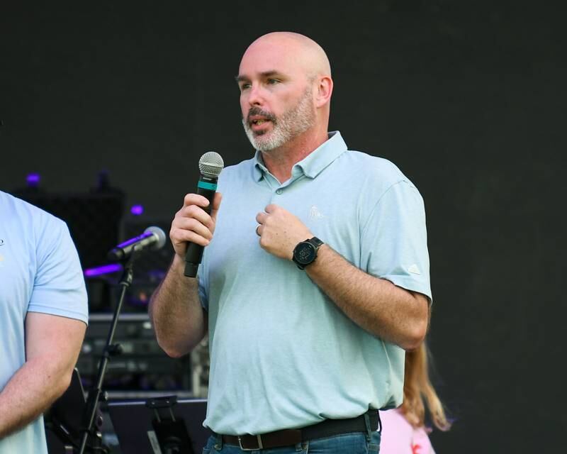 Oswegoland Park District Executive Director Tom Betsinger welcomes everyone to opening night of PrairieFest on Thursday June 12, 2025, held at PrairieFest Park in Oswego.