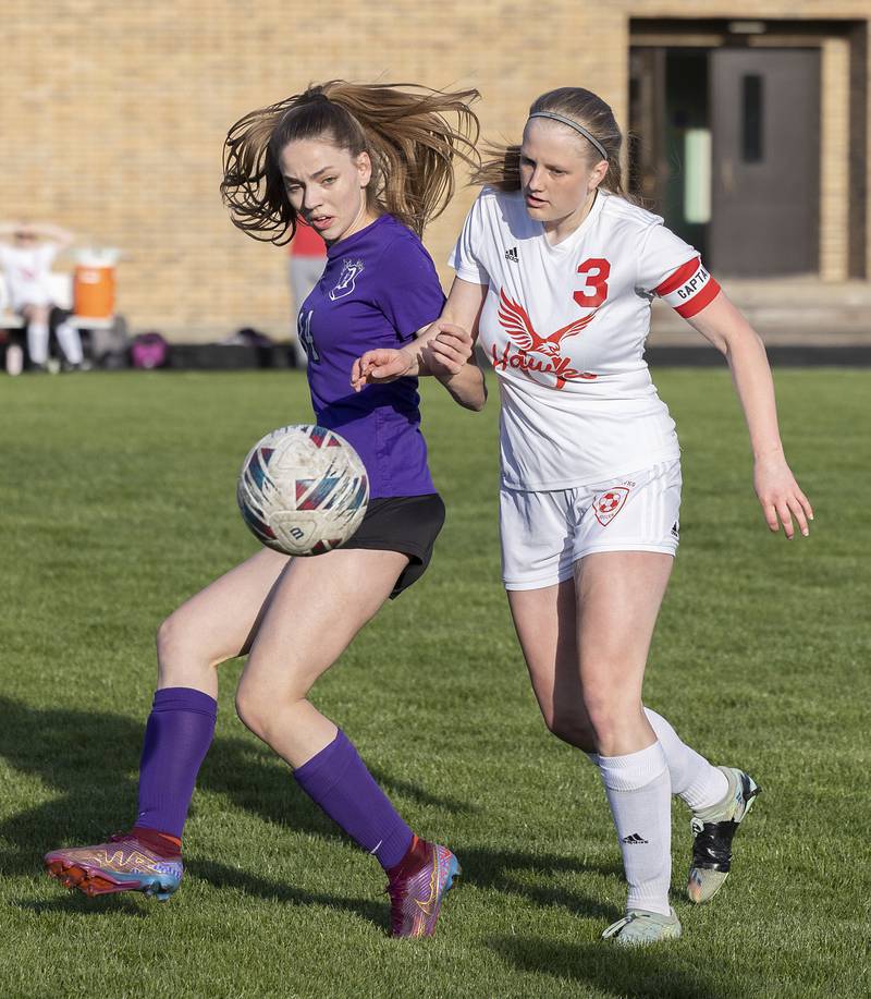 Dixon’s Maggie Van Sickle and Oregon’s Deborah Schmid go after the ball Thursday, April 25, 2024 at Dixon High School.