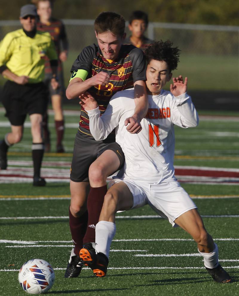 Richmond-Burton's Sean Rockwell battles with Winnebago's Wyatt Webb for the ball during the IHSA Class 1A Richmond-Burton Regional Final soccer match Tuesday, Oct. 17, 2023, at Richmond-Burton High School in Richmond.
