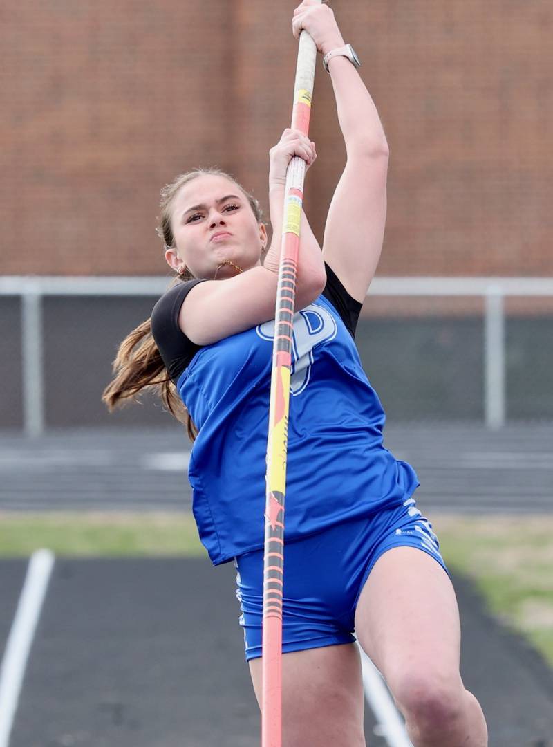 Princeton's Annie Thompson prepares for lift-off in the pole vault in Thursday's Howard-Monier Invite.
