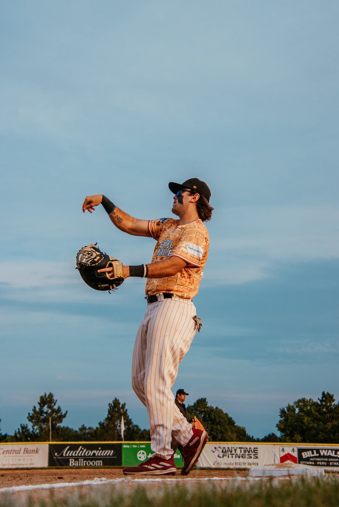 Pambos Nicolaudes warms up during the Illinois Valley Pistol Shrimp's 15-0 loss to the Normal CornBelters on Saturday, July 20, 2024 at Schweickert Stadium in Peru.