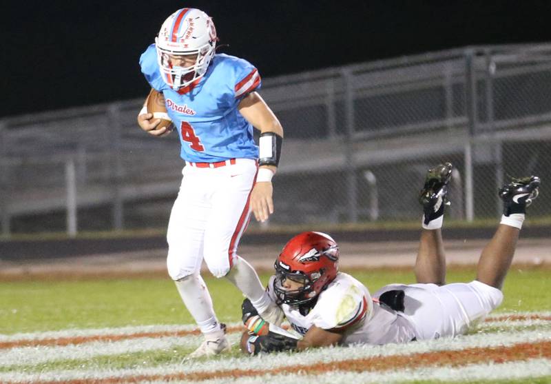 Ottawa's Logan Mills avoids the sack from Granite City on Friday, Oct. 24, 2025 on Kingman Field at Ottawa High School.