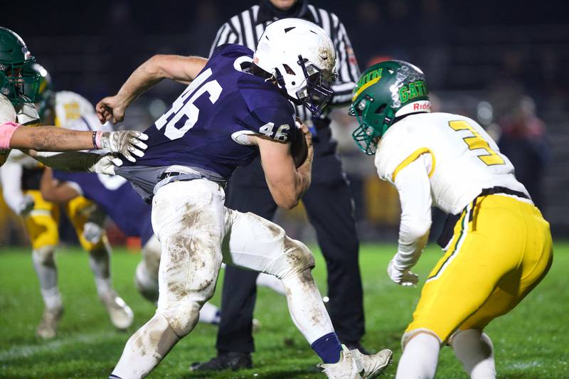 Crystal Lake South's defense tries to stop Gary- Grove's Logan Abrams on Friday, Oct. 13 2023 in Cary Grove.