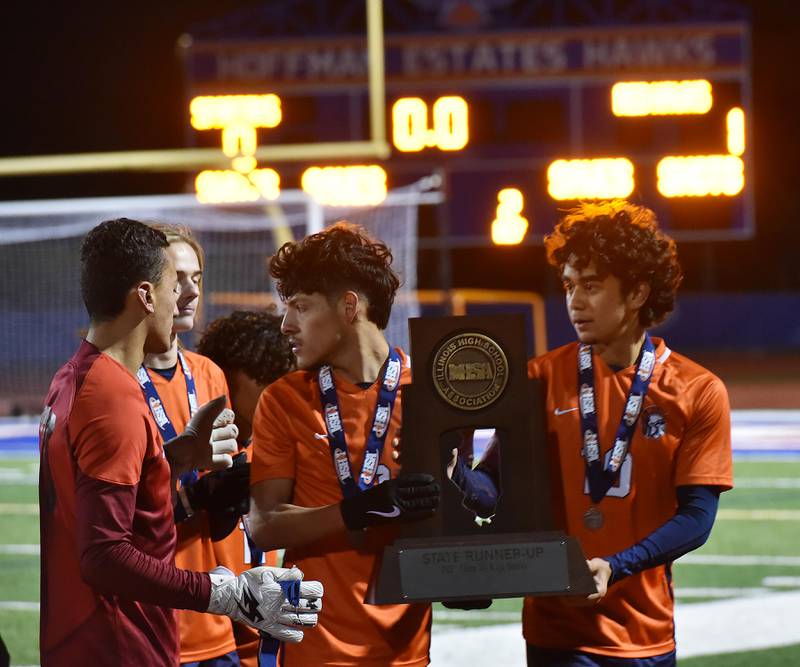 John Starks/jstarks@dailyherald.com
Romeoville accepts their runner up trophy in the Class 3A championship game of the boys state soccer tournament in Hoffman Estates on Saturday, November 5, 2022.