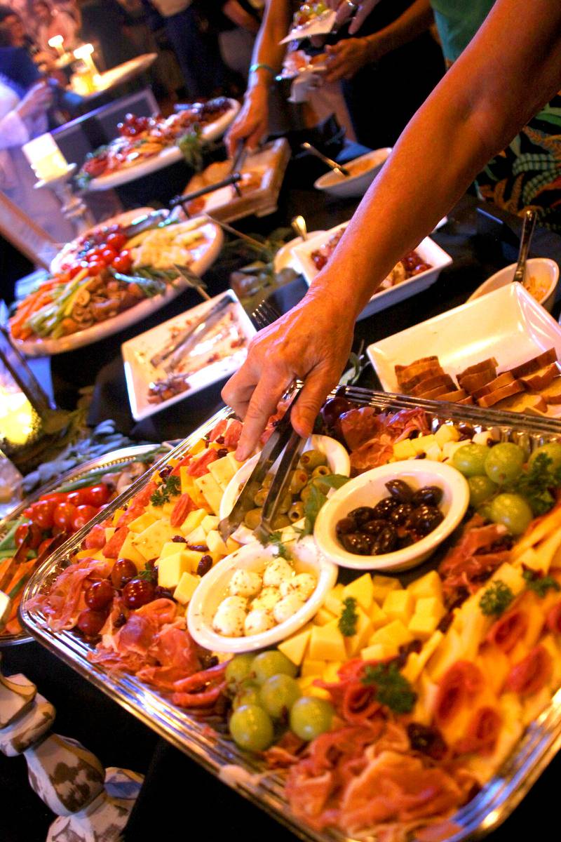 People sample food during Shaw Media's Best of the Fox celebration at Lou’s Lounge at the Dole in Crystal Lake on Thursday, Sept. 18, 2025.