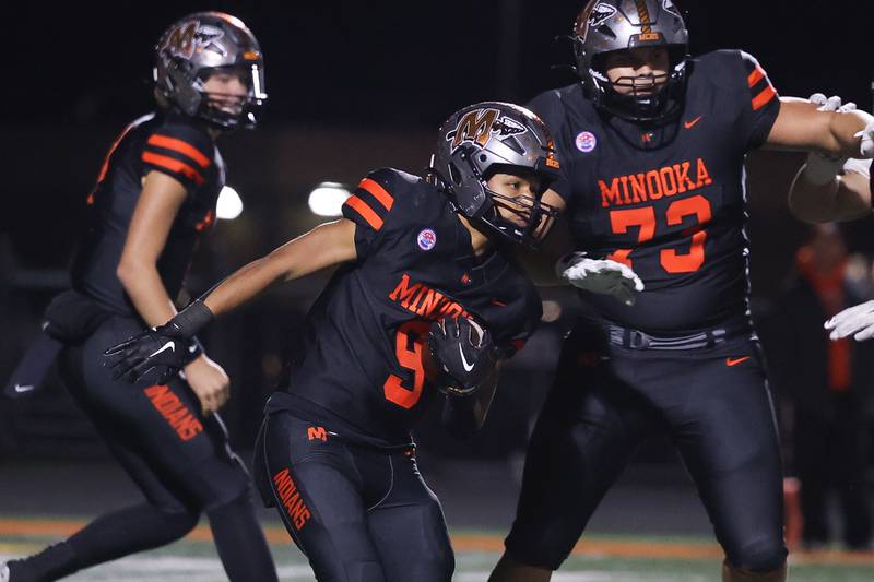 Minooka’s Paris Spears rushes against Lincoln-Way East on Friday, Nov. 8, 2024 in Minooka.