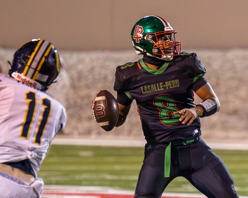 Marion Persich (8) of L-P looks for open receiver on Friday, October 24, 2025 at Howard Fellows Stadium in LaSalle.