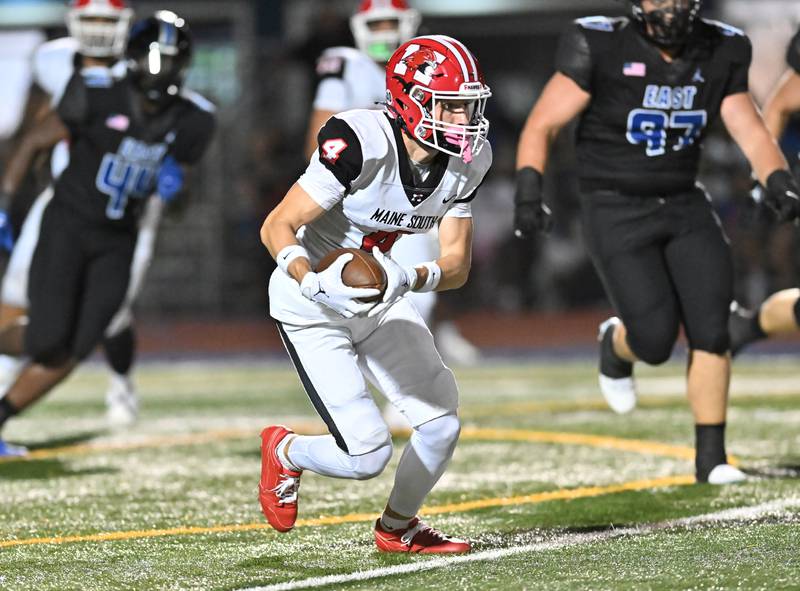 Maine South's Jacob Vitel tries to gain yards after catching a pass during a non-conference game against Lincoln-Way East on Friday, Aug. 30, 2024, at Frankfort. (Dean Reid for Shaw Local News Network)