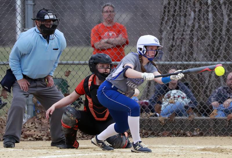 PHS freshman leadoff hitter Kelsea Klingenberg lays down a bunt at Kewanee Tuesday. The Tigresses won 4-0.