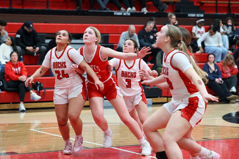 Ottawa's Libby Muffler and Bradley-Bourbonnais' Jayden Vaughn (24) and Katie McBurnie (3) vie for a rebound on a free throw during Ottawa's 55-44 victory on Monday, Feb. 9, 2026.