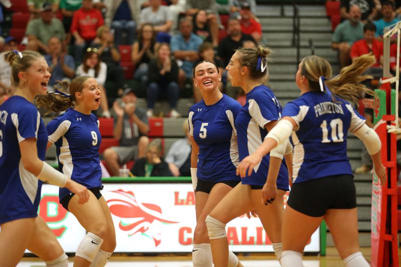 Members of the Princeton volleyball team react after getting a point against L-P on Tuesday, Aug. 26, 2025 in AJ Sellett Gymnasium at L-P High School.